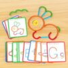 Toddler playing with wooden sticks and rings puzzle – develops motor skills, coordination, and logical thinking